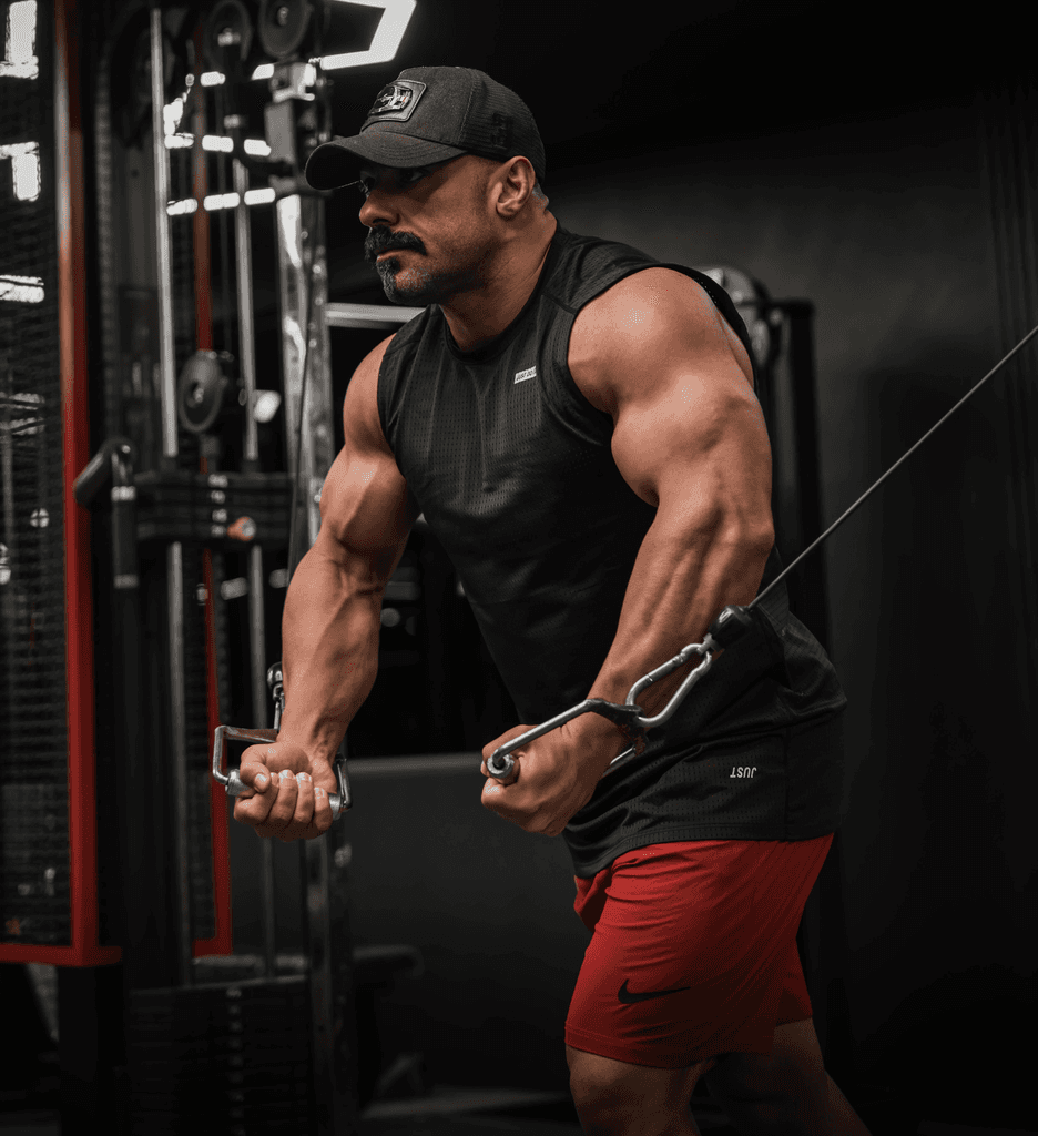 Athlete performing an intense dumbbell workout