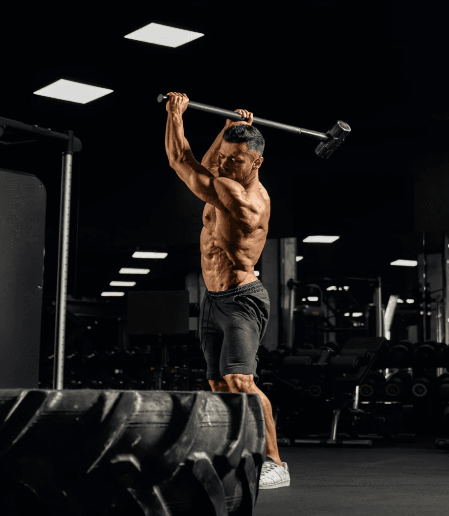 Athlete training with a sledgehammer